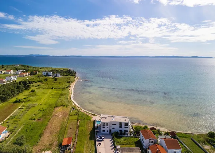 Jimmys - Direkt Am Meer, Tollem Blick Und Beheiztem Pool Apartmán